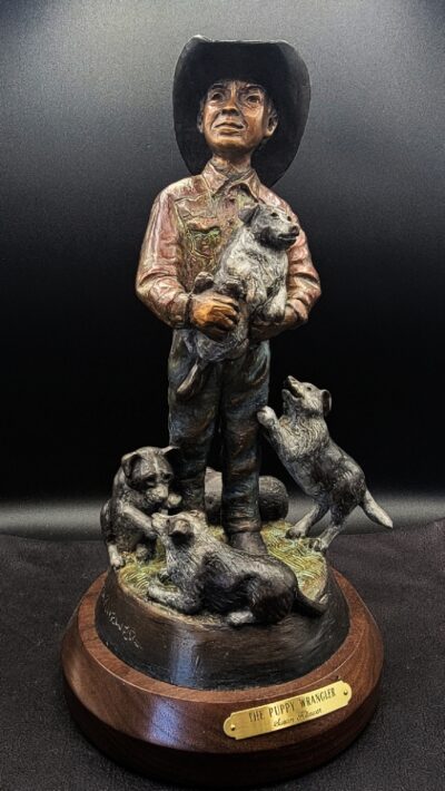 The Puppy Wrangler Bronze by Susan Kliewer