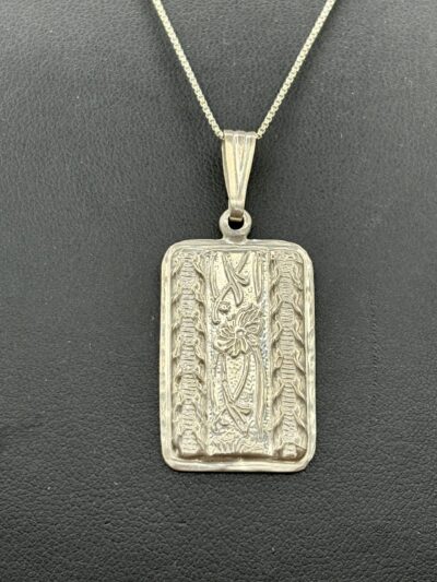 Sterling Silver Floral Design Pendant by Tom Yazzie TYP908